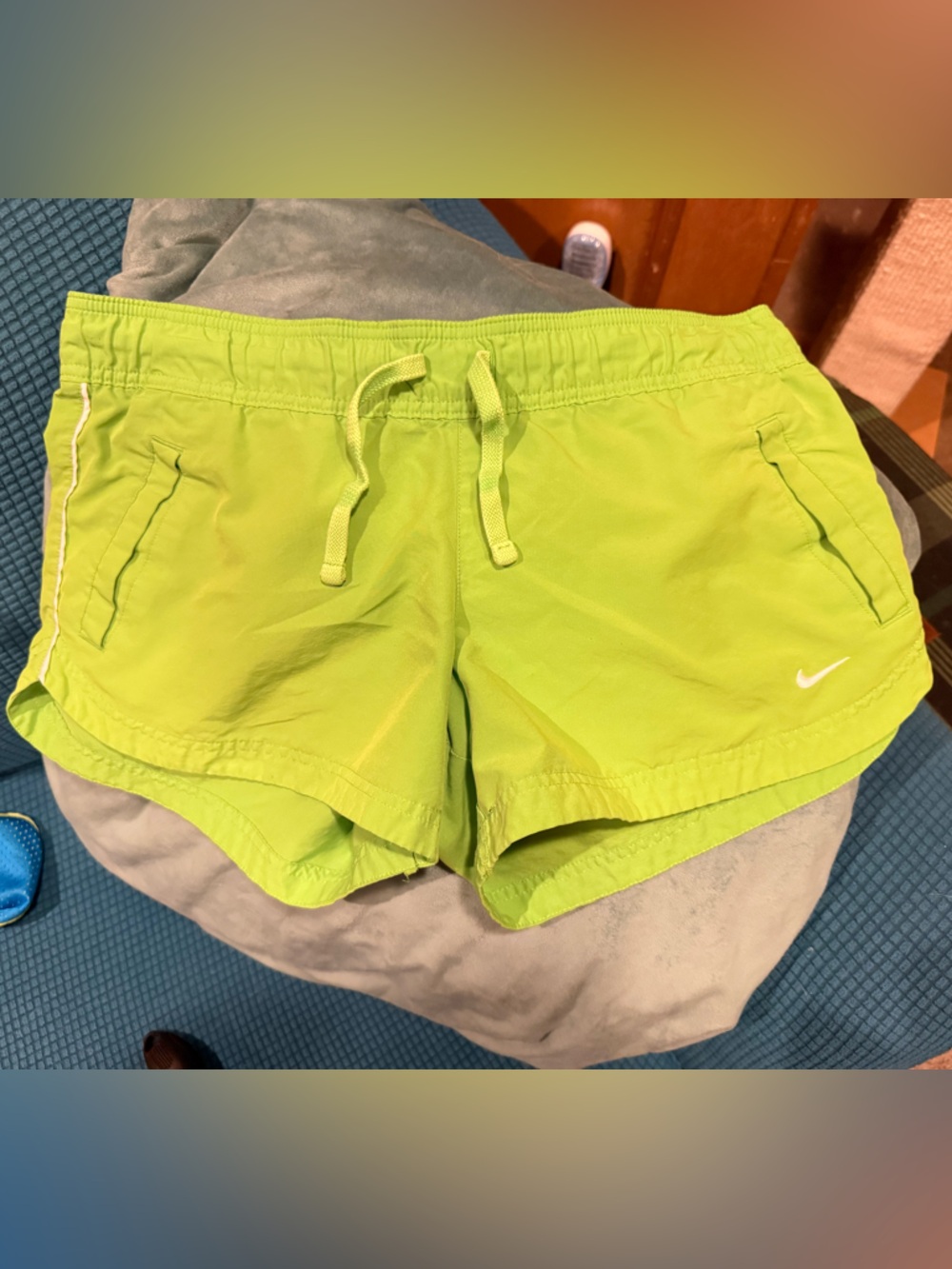 Lime green vintage Nike shorts with pockets